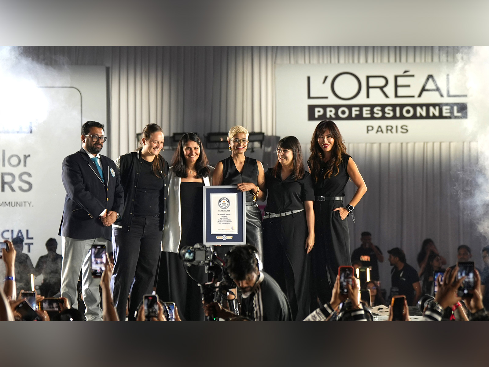 L’Oréal Professionnel team celebrating Guinness World Record at NESCO Mumbai.