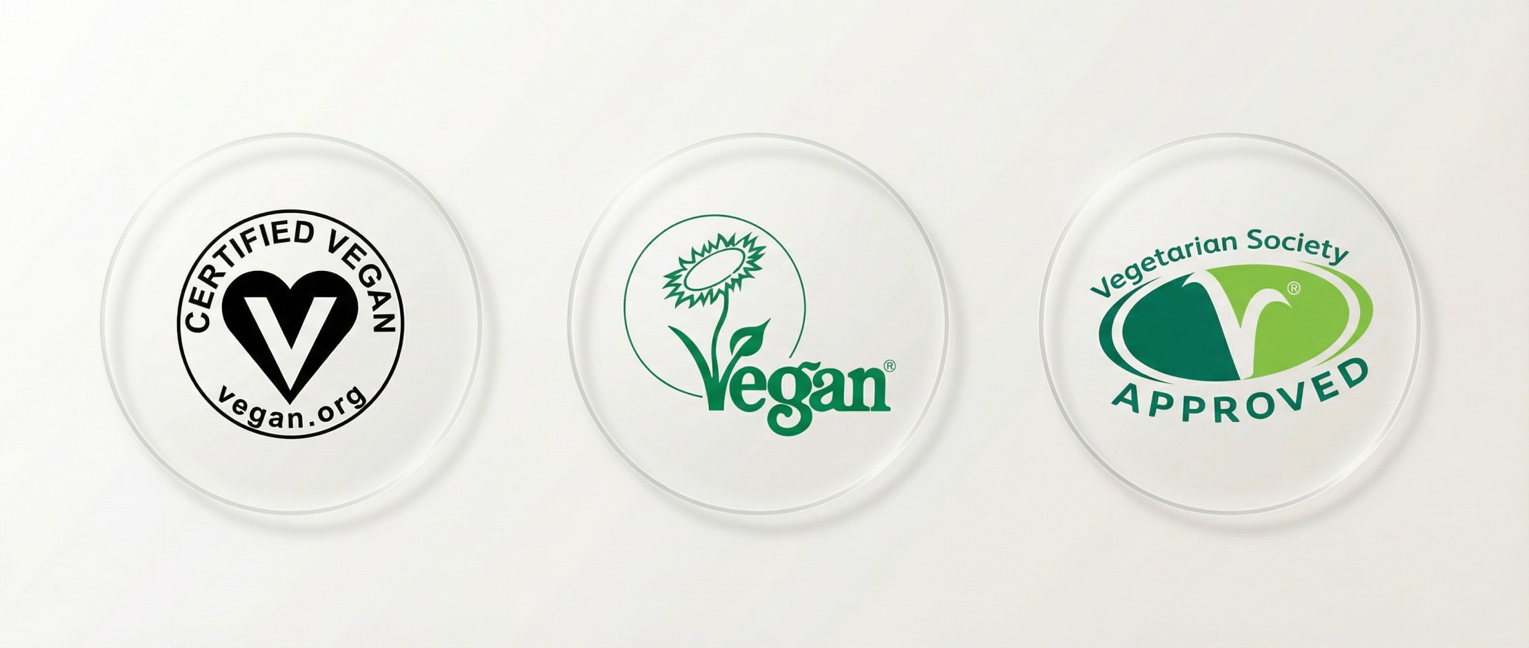Vegan certification logos including Certified Vegan, Vegan Society, and Vegetarian Society Approved displayed on clean white background