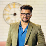 Influencer Nitin Joshi presenting sunscreen SPF test results.